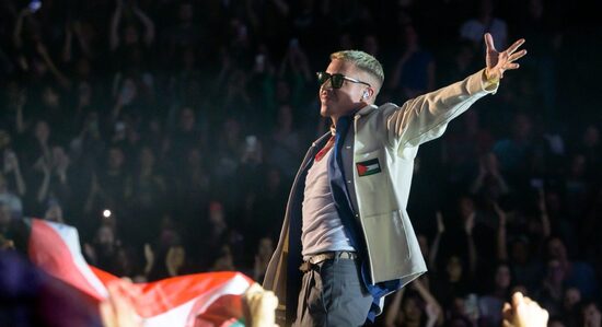 Macklemore Is a Seattle Sports Superfan. Now, He Is Also a Target.